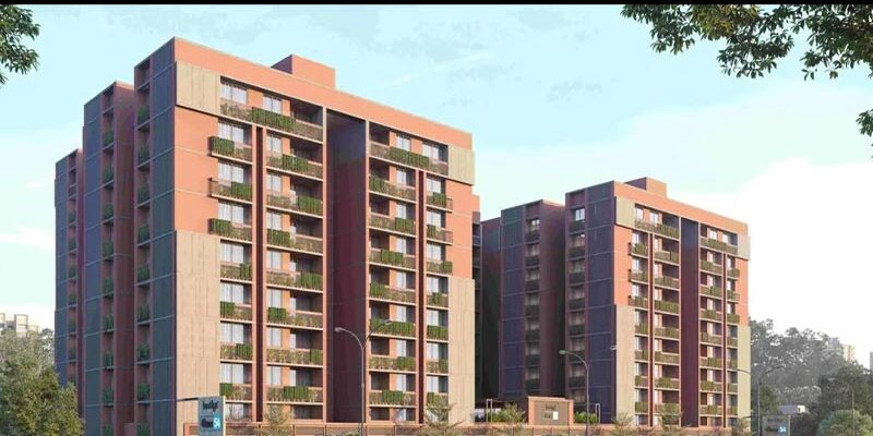 Modern 3BHK flat exterior by Kautilya Group Developers in Ahmedabad with landscaped gardens and premium architecture.